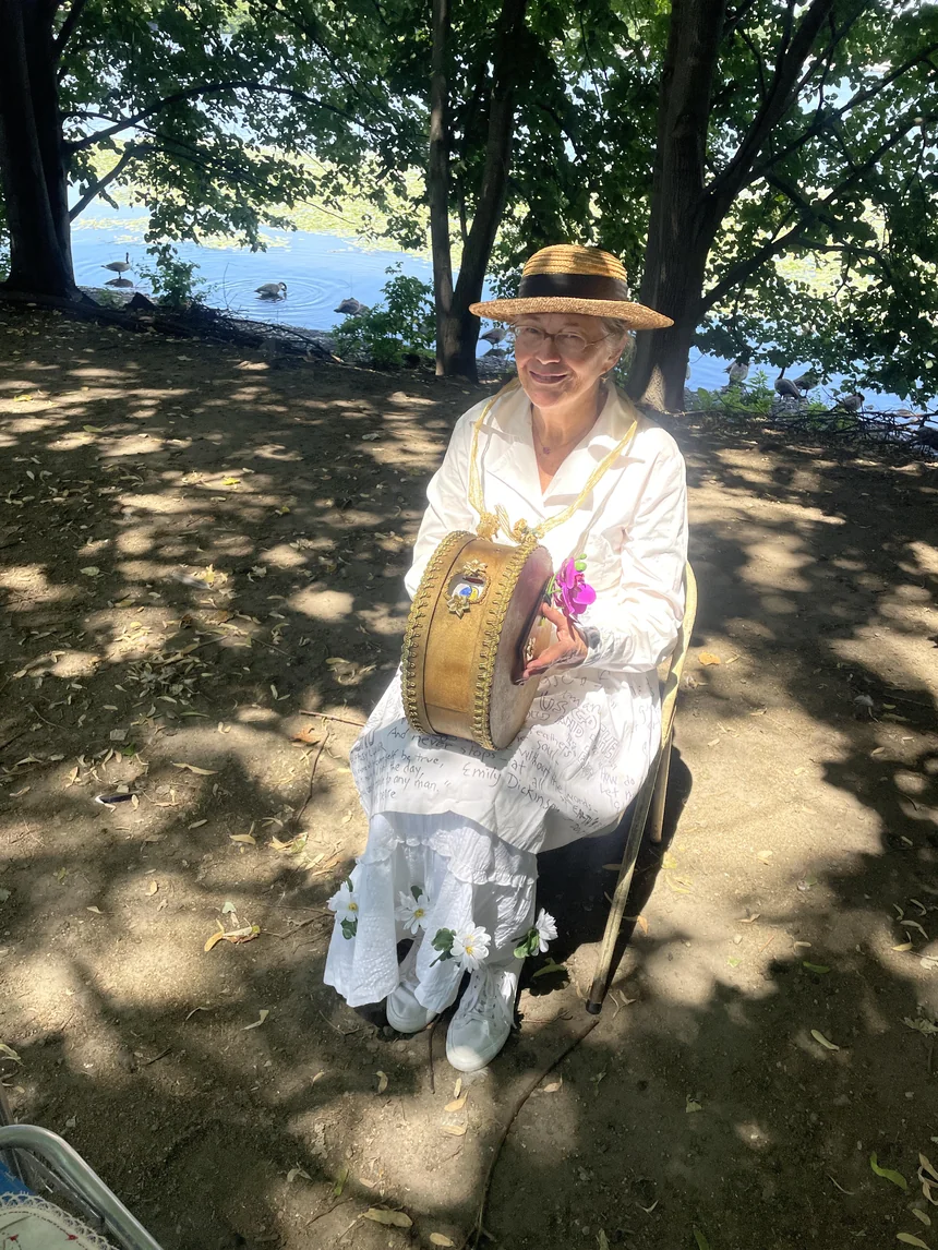 Whimsical Wise Woman in White Offers Picture Roulette